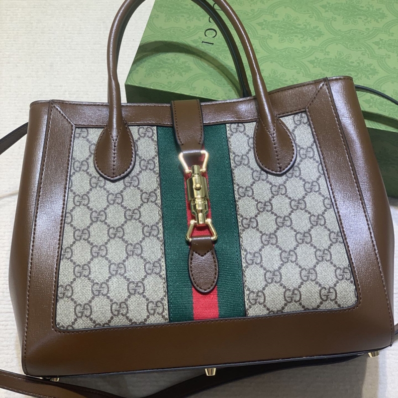 G*u*i shopping bags